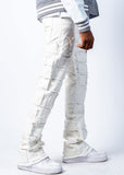 model wearing white stacked jeans